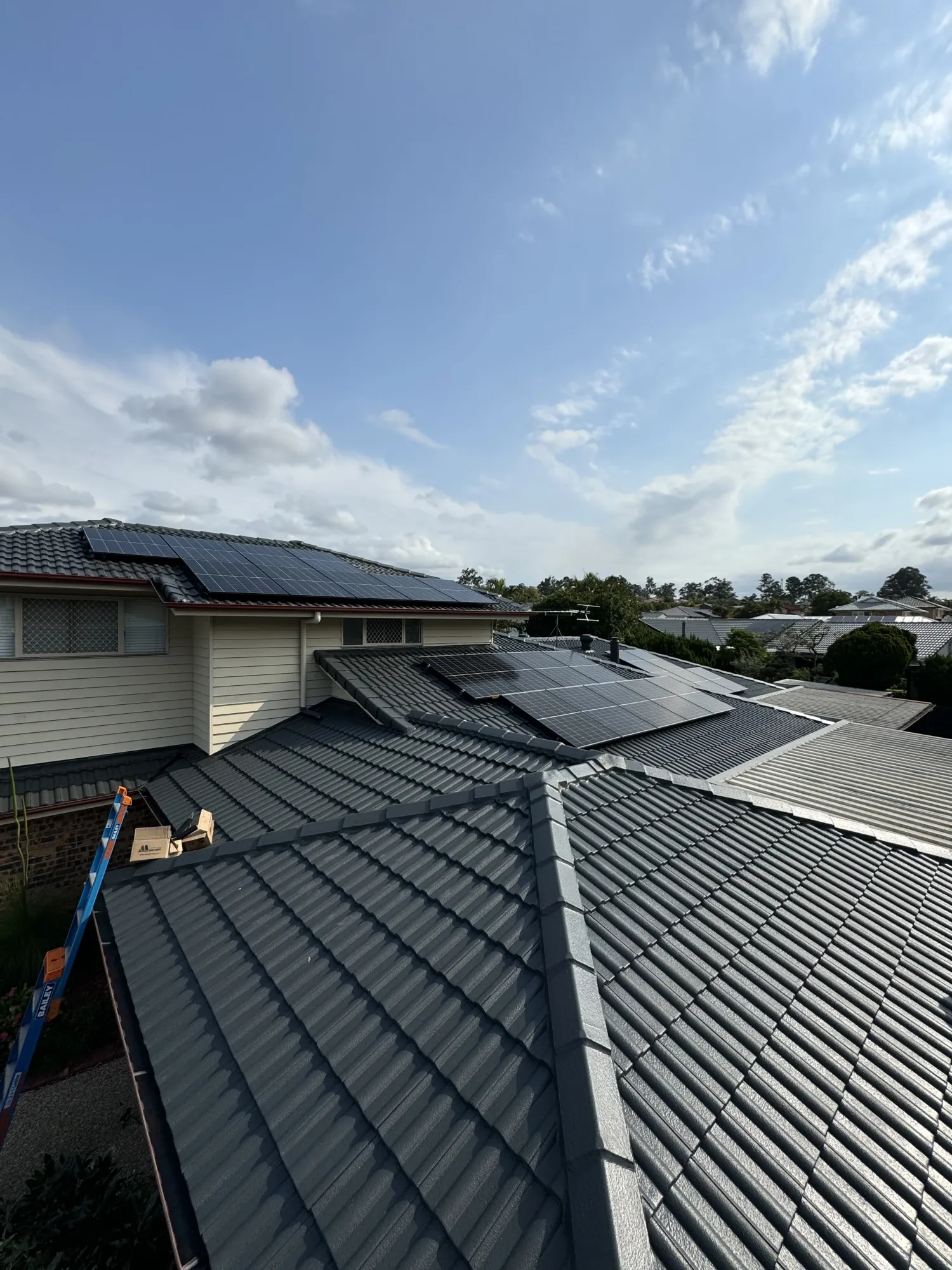 Solar panels installed across a tiled Gold Coast roof by Ryder Electrical Services