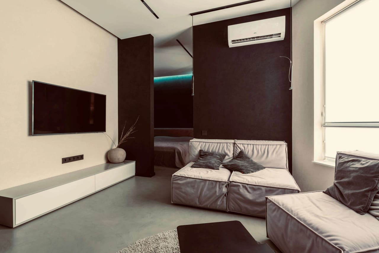 A wall-mounted split system air conditioner installed in a Gold Coast living room